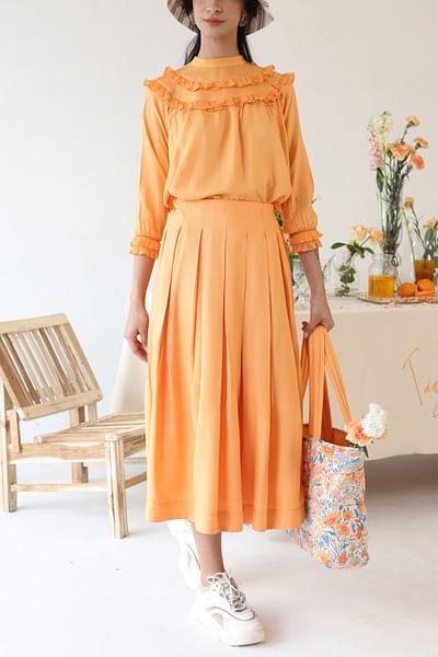 Orange frilled top
