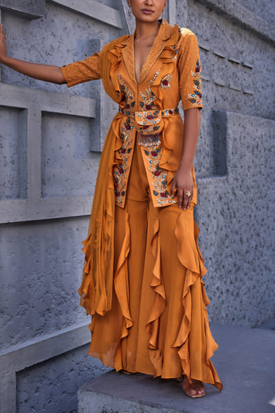 Miku Kumar Orange jacket and ruffled sharara set MKUJAN24D221