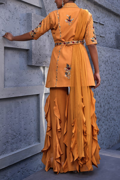 Miku Kumar Orange jacket and ruffled sharara set MKUJAN24D221