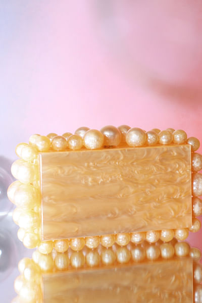 Orange resin clutch