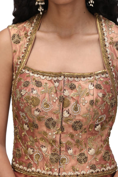Pale embroidered corset blouse