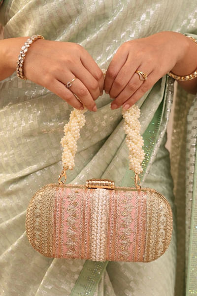 Pastel embroidered clutch