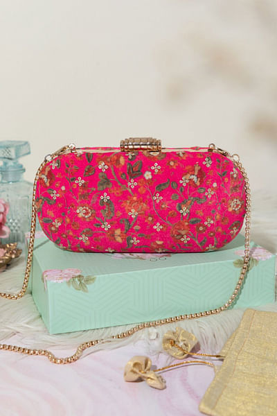 Pink floral printed capsule clutch
