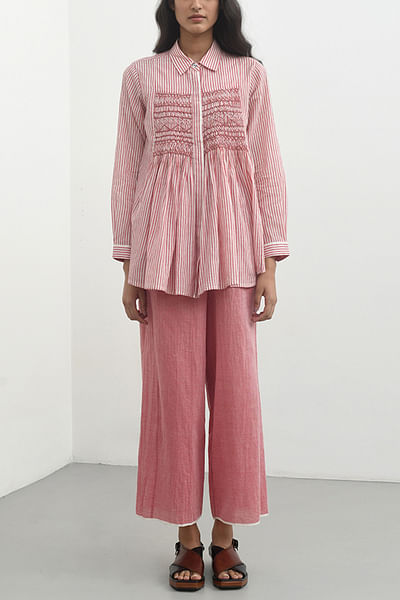 Pink striped smocked flared shirt