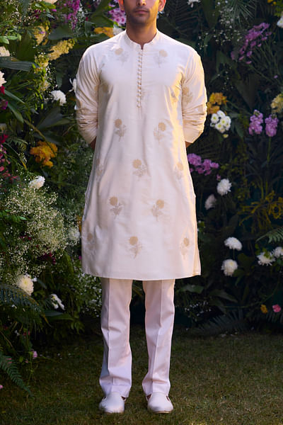 Pristine white floral embroidered kurta set