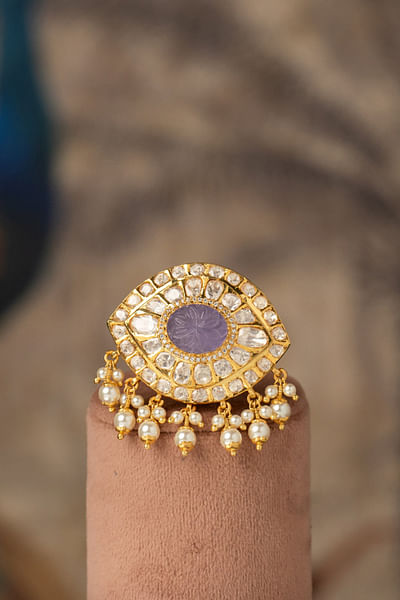 Purple and white eye semi-precious stone kalangi
