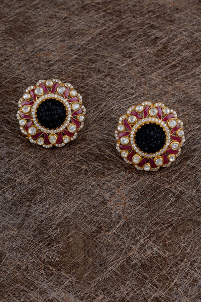 Red and blue floral studs