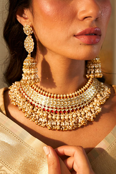 Red and gold kundan and pearl necklace set