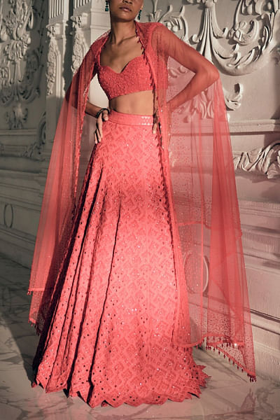 Red and orange geometric cutwork lehenga set