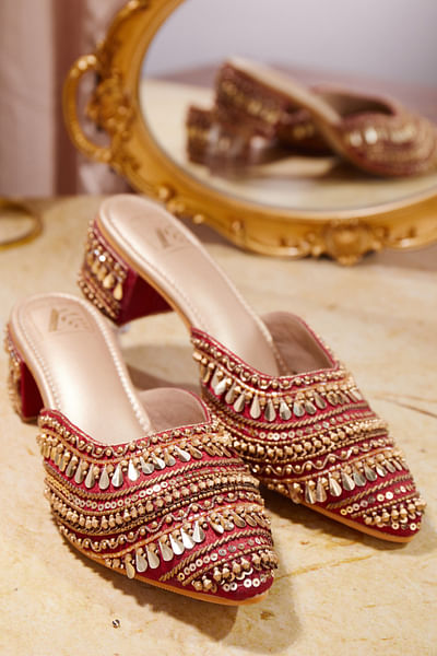 Red embellished mule heels