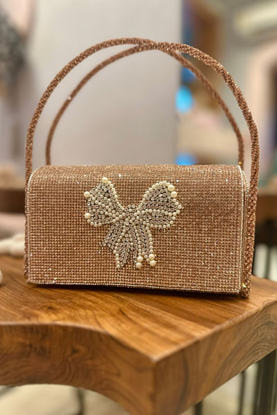 Rose gold bow crystal embellished bag