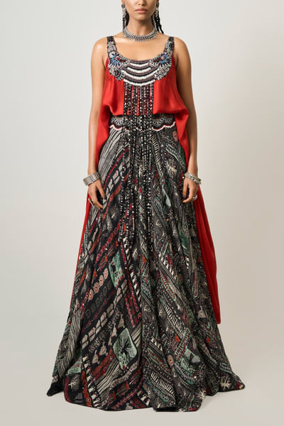Rust orange singlet and lehenga