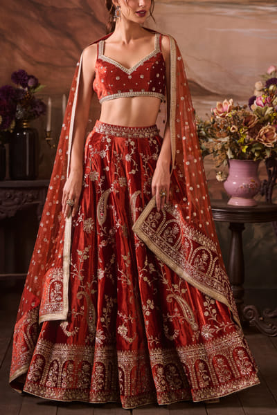 Rust zari embroidered velvet lehenga set