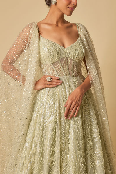 Sage green embroidered cape gown