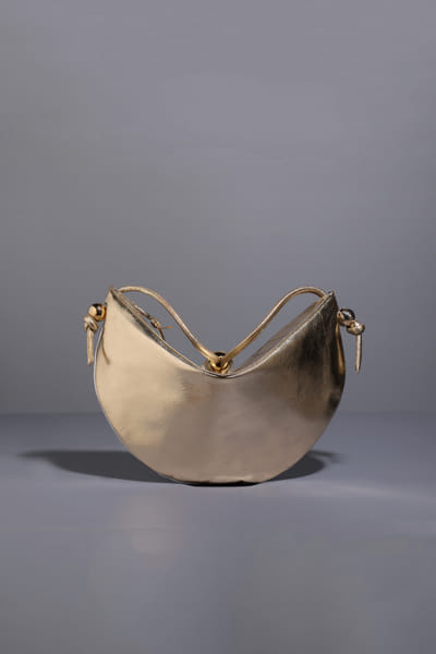 Silver and gold quilted pouch bag