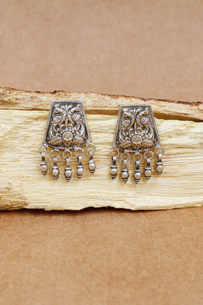 Silver bird carved earrings