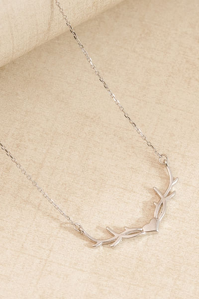 Silver deer antler and heart necklace