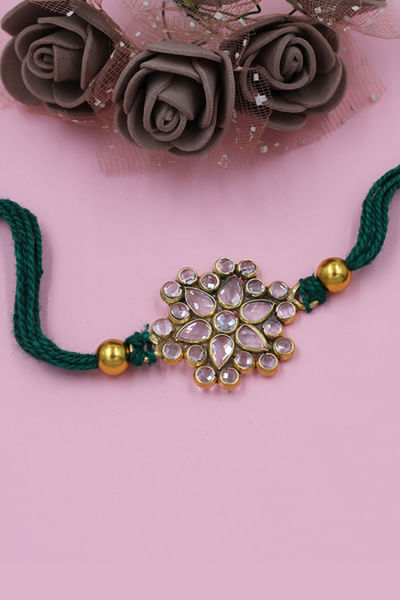 Silver embellished thread rakhi