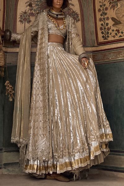Silver embroidered jacket and gota lehenga set