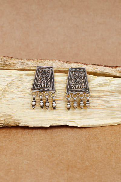 Silver geometric carved oxidised earrings