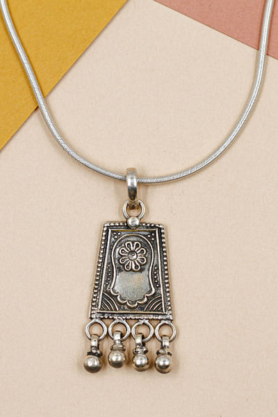 Silver geometric carved pendant necklace