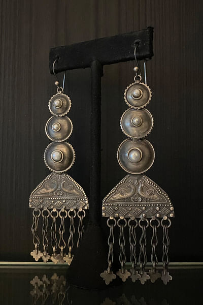 Silver peacock pearl tasselled earrings