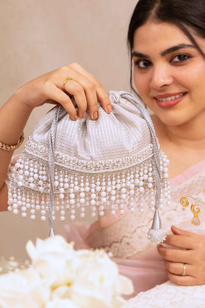 Silver pearl tasselled potli bag