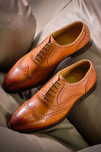 Tan perforated brouges