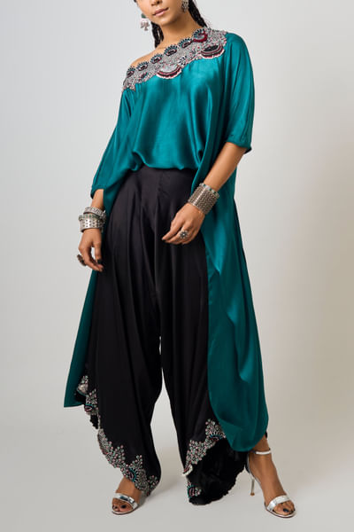 Teal off-shoulder top and drape pants