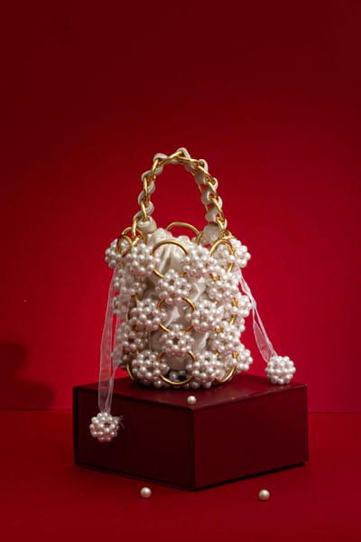 White and gold pearl bucket bag