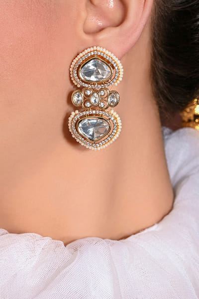 White and gold polki and kundan danglers