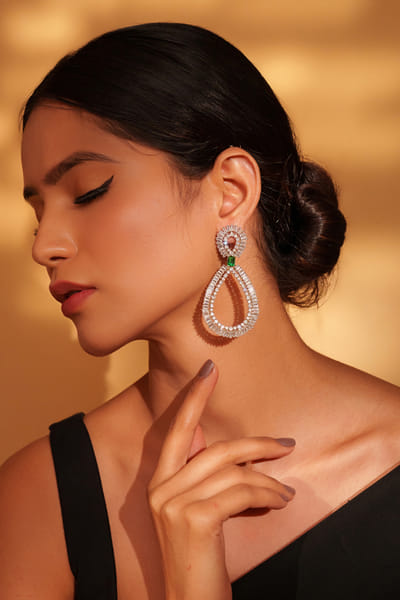 White and green diamond earrings