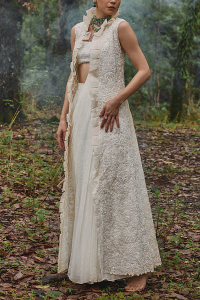 White embroidered jacket and draped sari set