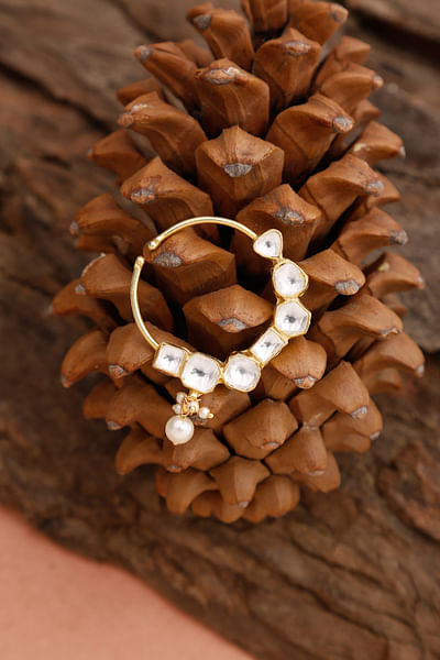 White faux kundan and pearl nose ring