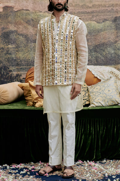 White lampi and mirror work bandi kurta set
