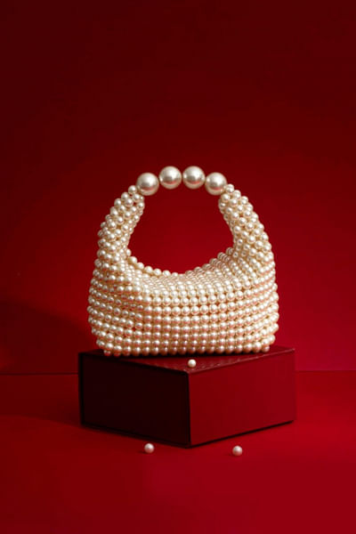 White pearl handbag