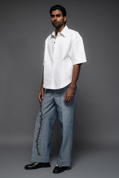White pleated shirt