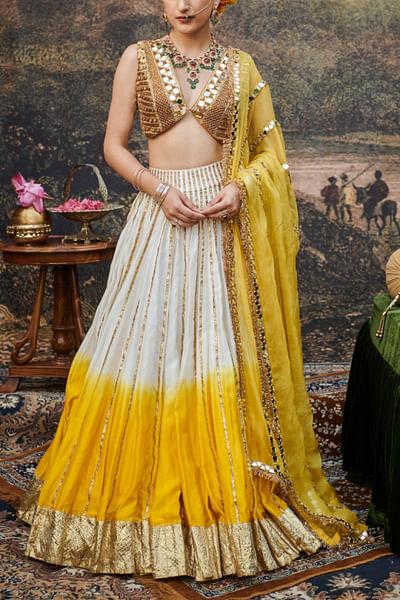 Yellow and white lehenga set