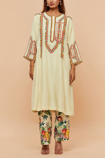 Yellow embroidered and tasselled kurta set