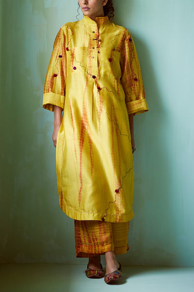 Yellow tie-dyed and tasselled kurta set