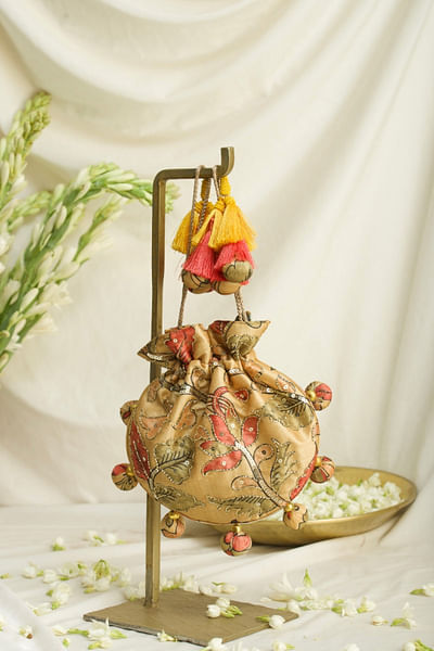 Beige floral kalamkari print potli bag
