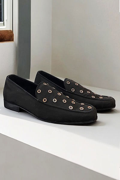 Black button embellished loafers