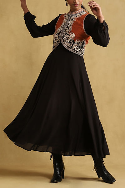 Black embroidered gilet and dress