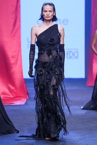 Black one-shoulder tasselled gown