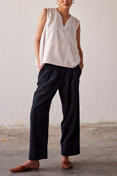 Black pleated trousers