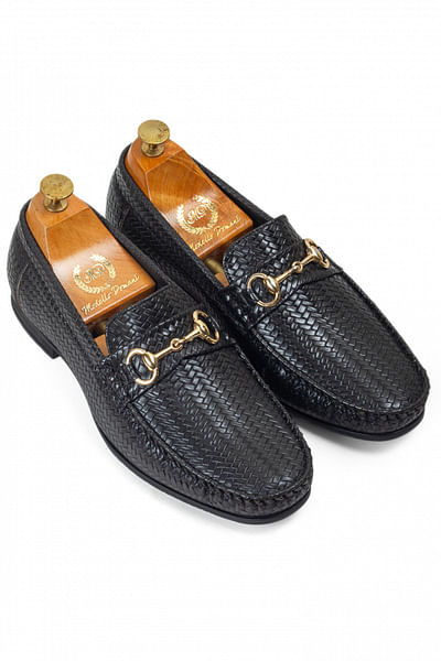 Black textured buckle loafers