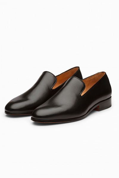Black Venetian wholecut leather loafers