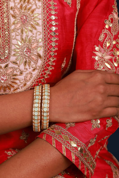 Blue kundan and pearl embellished bangles