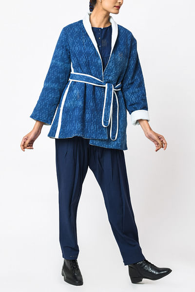 Blue quilted jacket and belt