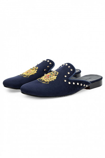 Blue royal emblem embroidery spiked mules